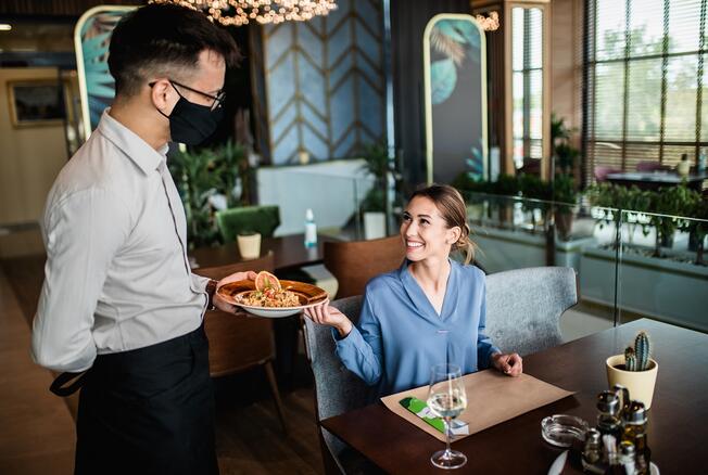 Girl smiling at the waiter